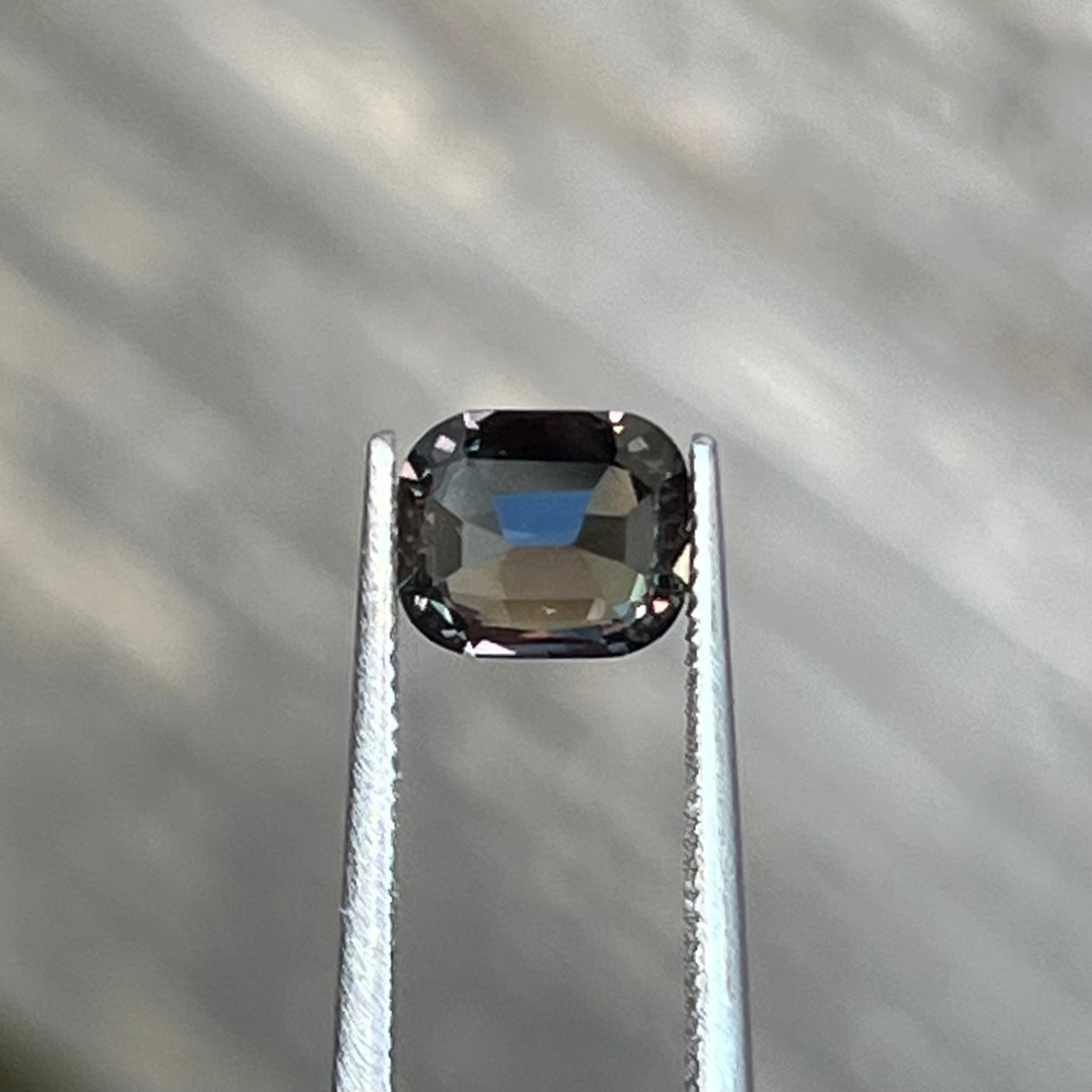 1.48ct Unheated Green to Pinkish Brown Colour Change Sapphire