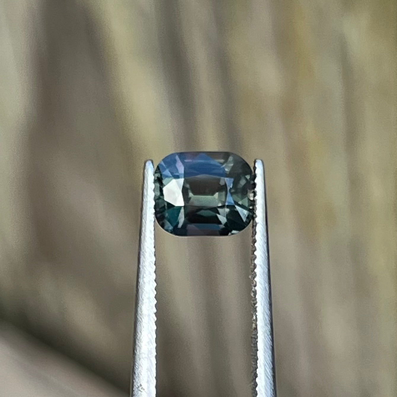 1.48ct Unheated Green to Pinkish Brown Colour Change Sapphire