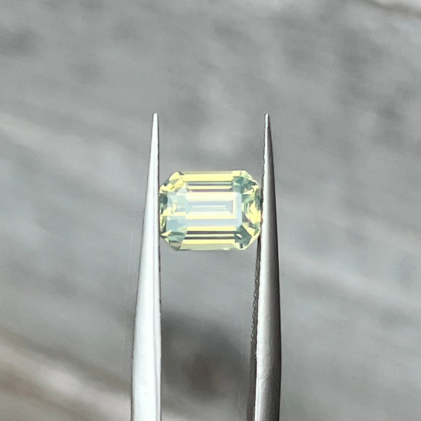 1.55ct Unheated Smoky Green Yellow Sapphire